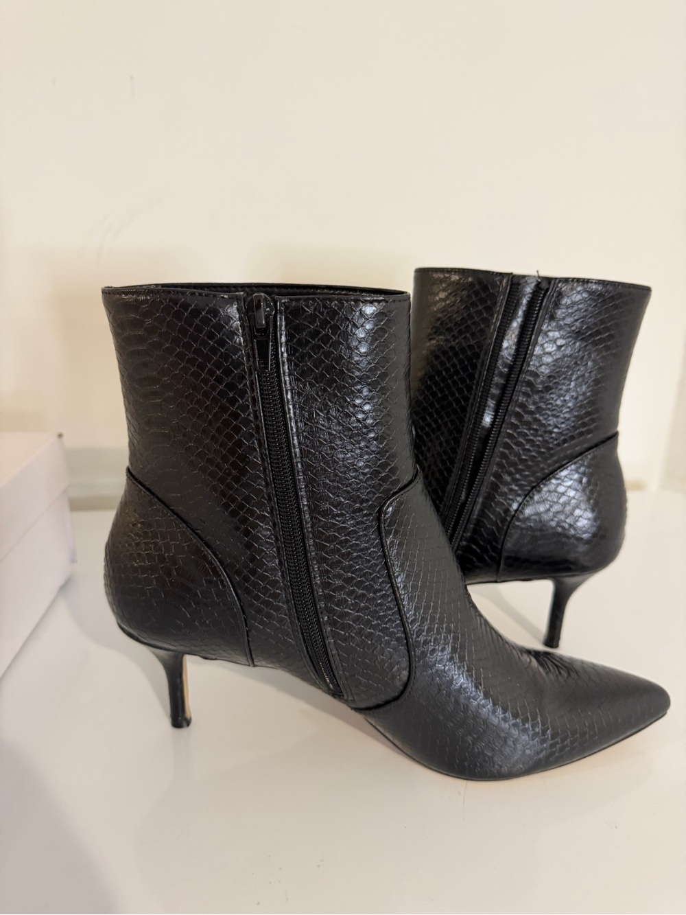 Rebecca Minkoff women’s Pointed Toe Snake-Embossed Ankle Booties